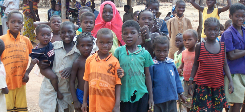 ghanakids72 I took this photo in a village in Burkina Faso in 2007. This is very typical of village life in West Africa. The kids are beautiful and hopeful and totally fascinated with digital photography.